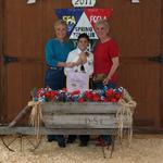 Reserve Champion Single Fryer Rabbit - Kyle Moorhead; Buyer - Norma Herndon, Nelwyn Hardy and Meyer Farm