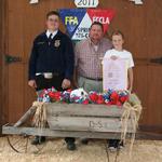 Reserve Champion Fryer Rabbits - Kevin Harrison; Buyer - Lindsey Construction