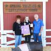 Grand Champion Swine - Kierstin Taylor CWFFA; Buyer - Larry's Bag of Smoke